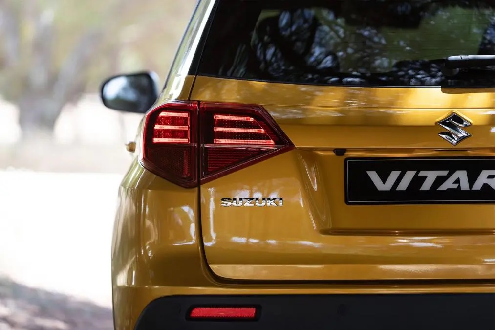 Orange Suzuki Vitara rear view