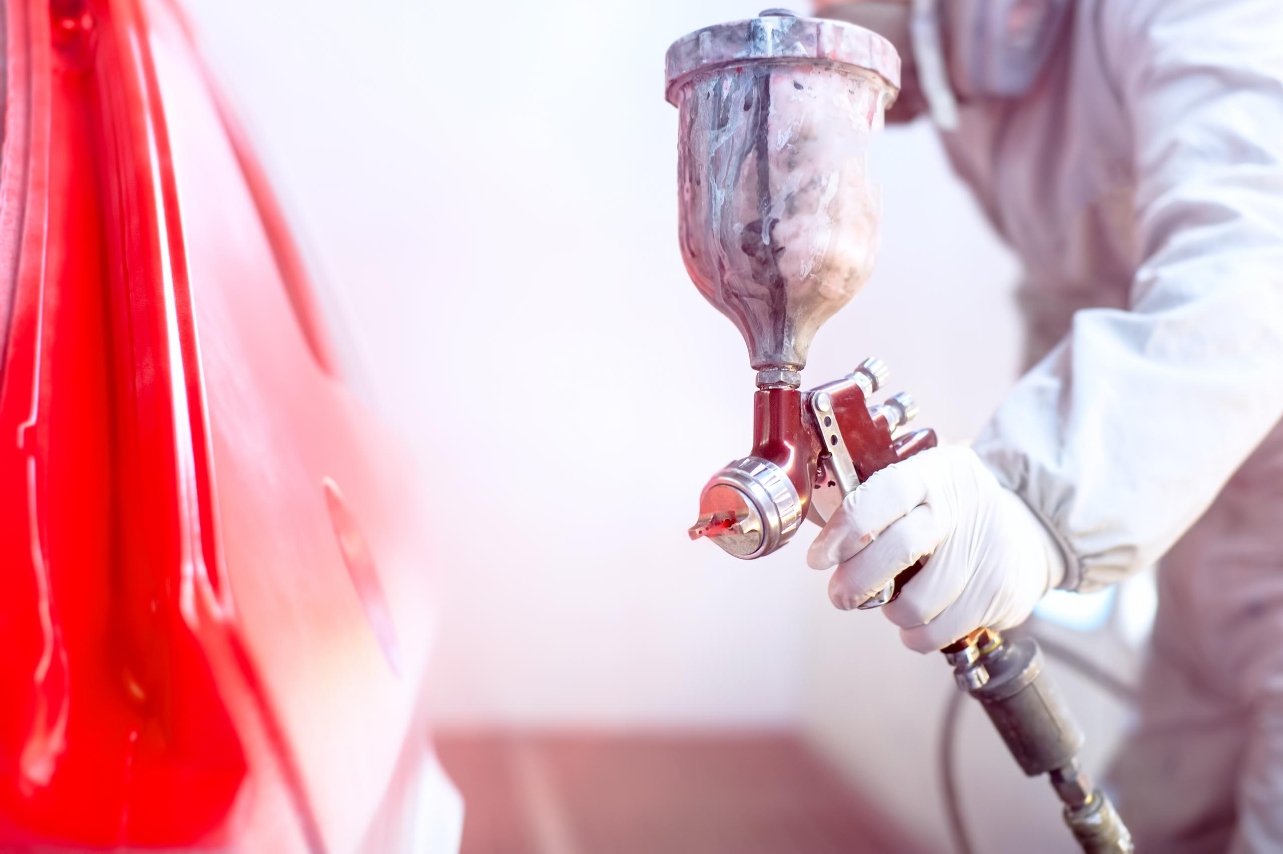Car being spray painted