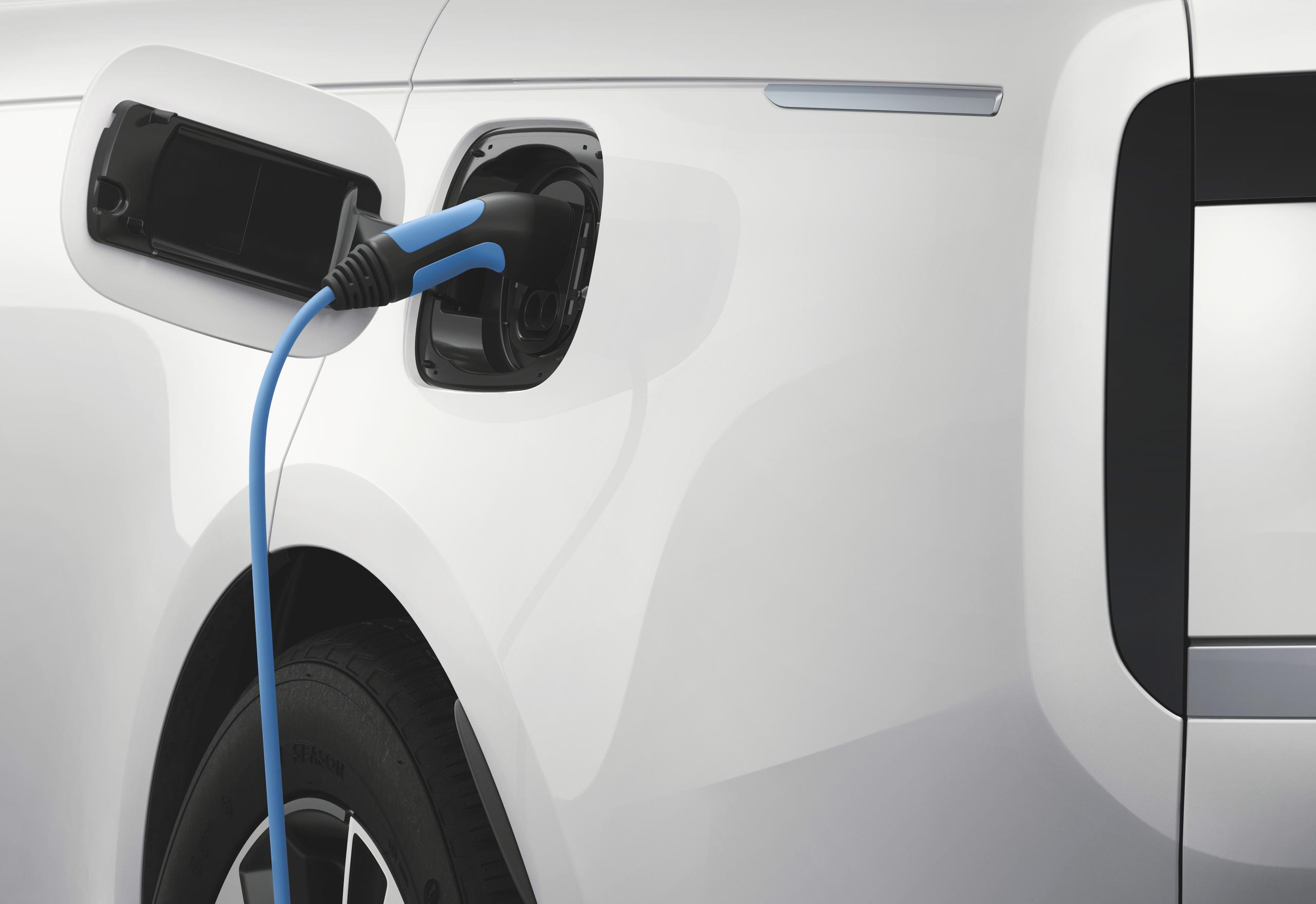 White Range Rover PHEV on charge