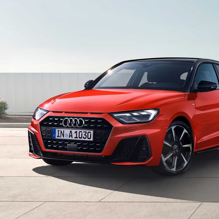 Red Audi A1 Sportback Front Side view