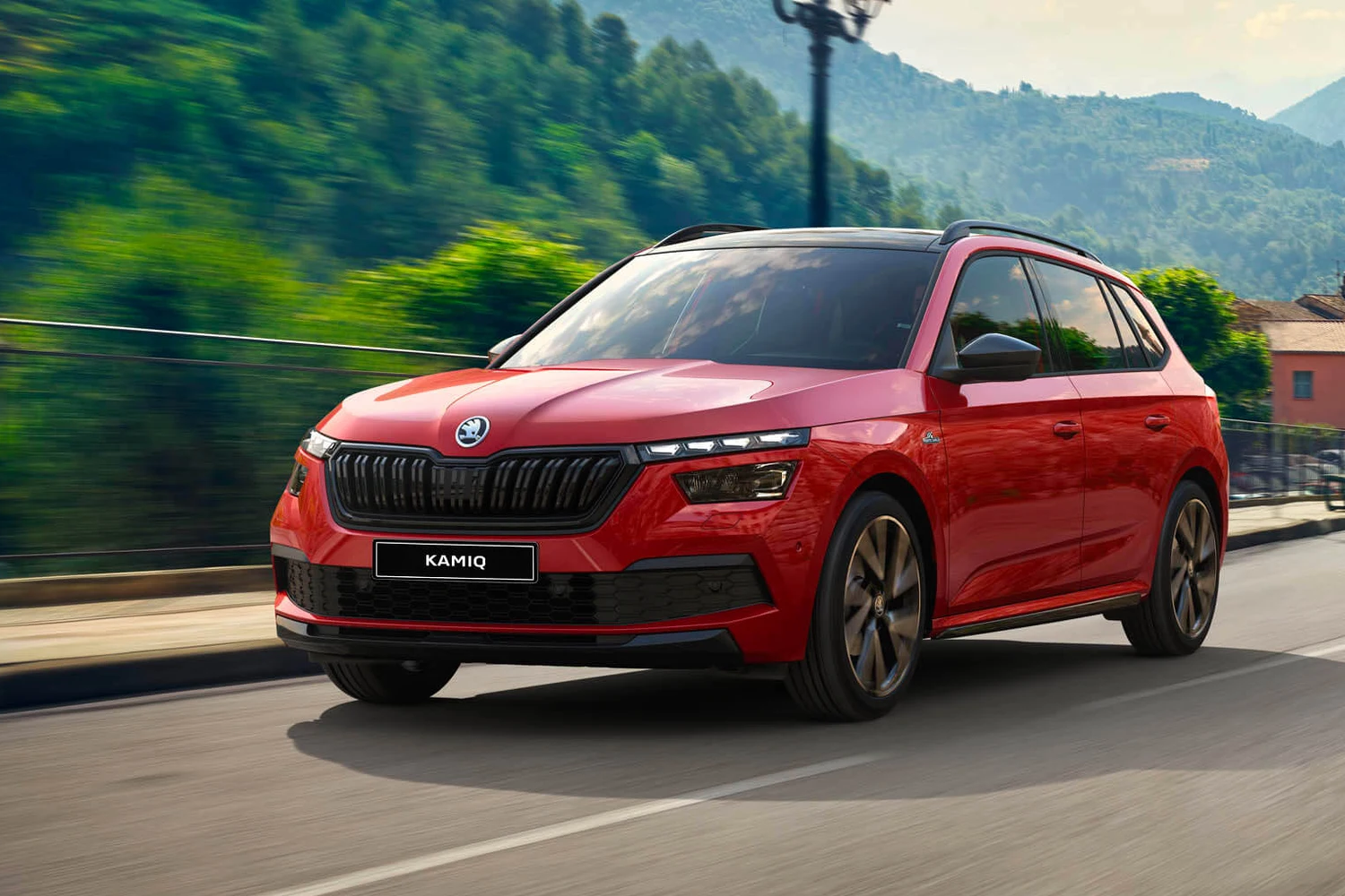 Red Skoda Kamiq on the road