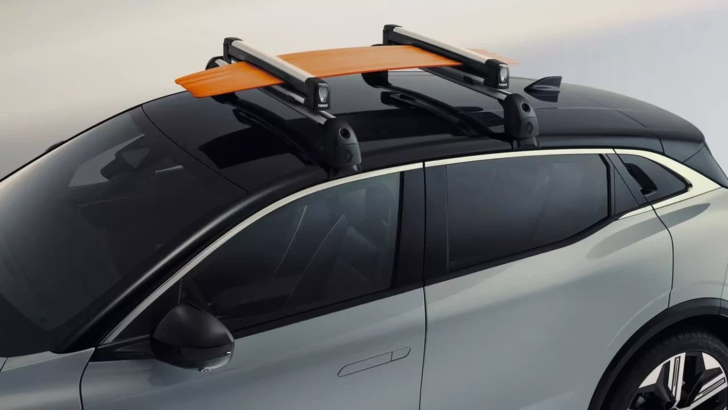 Renault vehicle roof bars fitted with accessories mounted on top of the car.