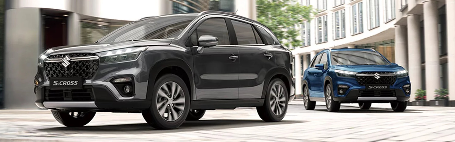 grey Suzuki S-Cross by a blue Suzuki S-Cross