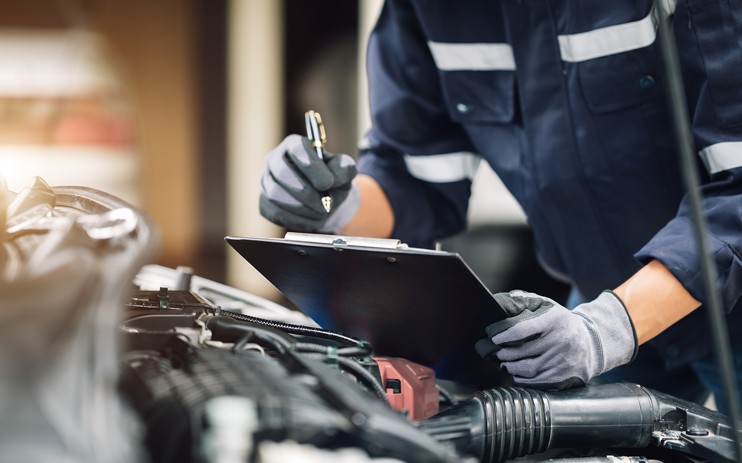 A mechanic performing aftercare