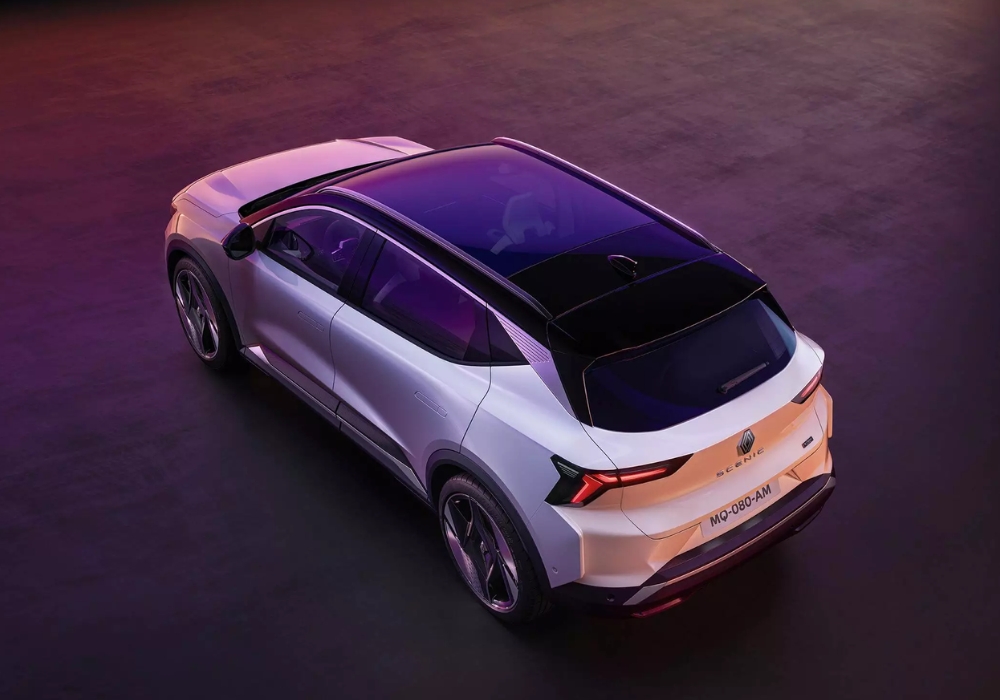 Rear three-quarter top-down view of Renault Scenic E-Tech showing panoramic roof and rear light design.