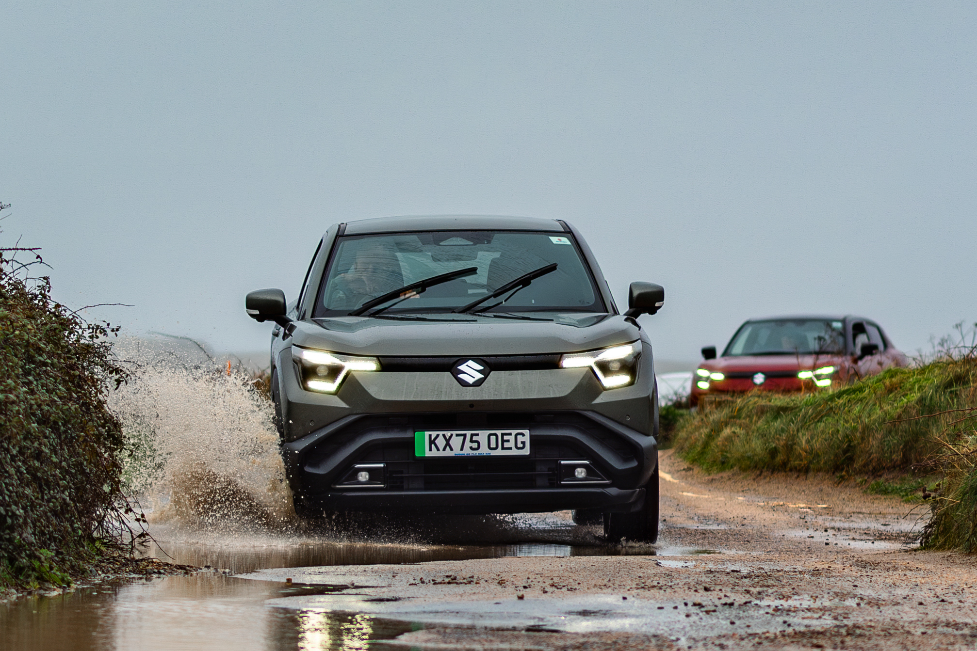 Suzuki e-vitara driving through water