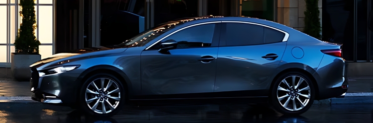 Mazda3 Saloon in grey exterior side view
