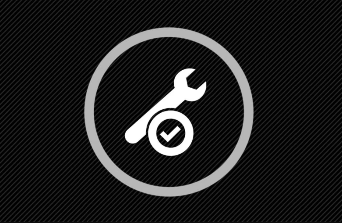 spanner with a tick icon