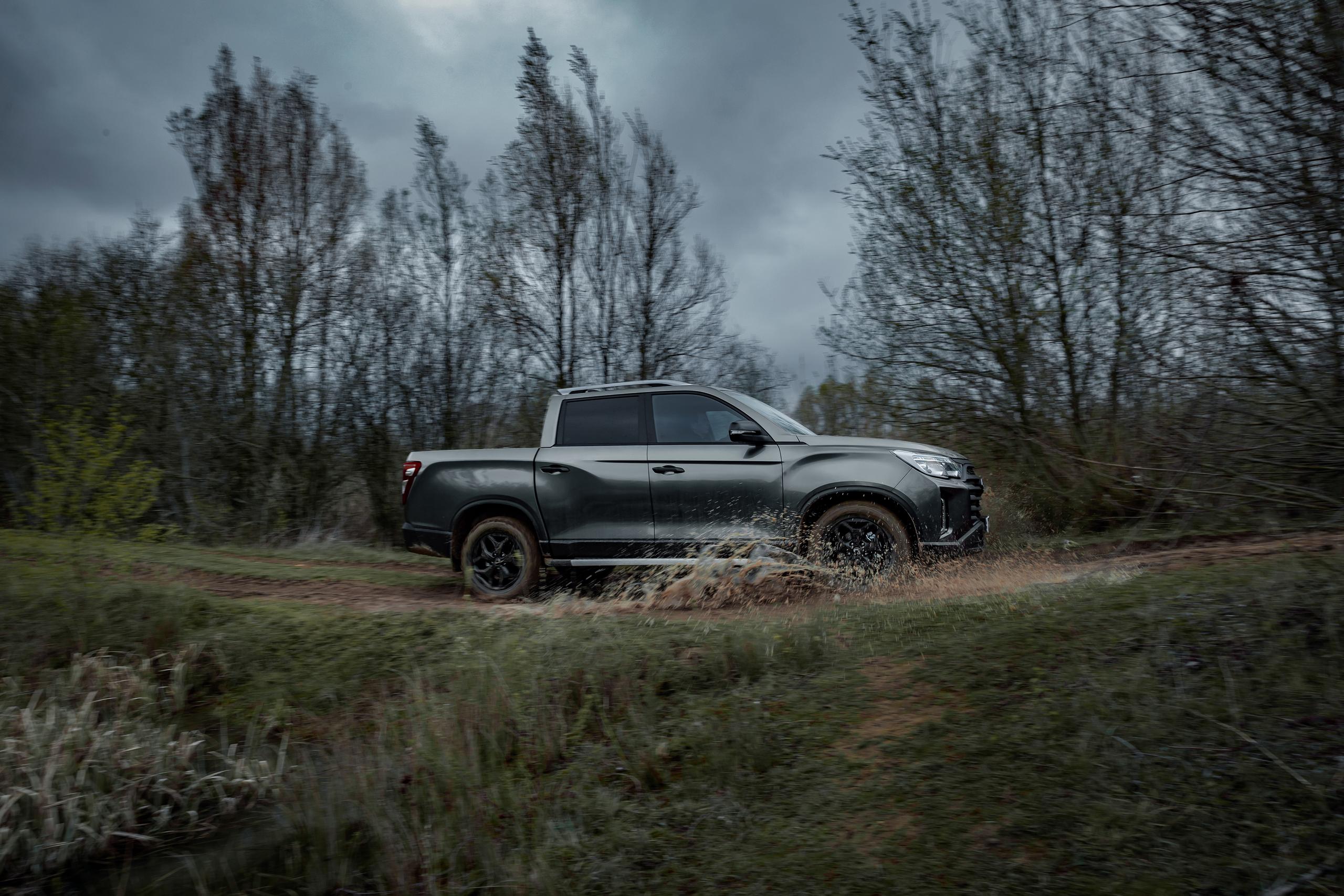 SsangYong Musso Pickup going through puddle