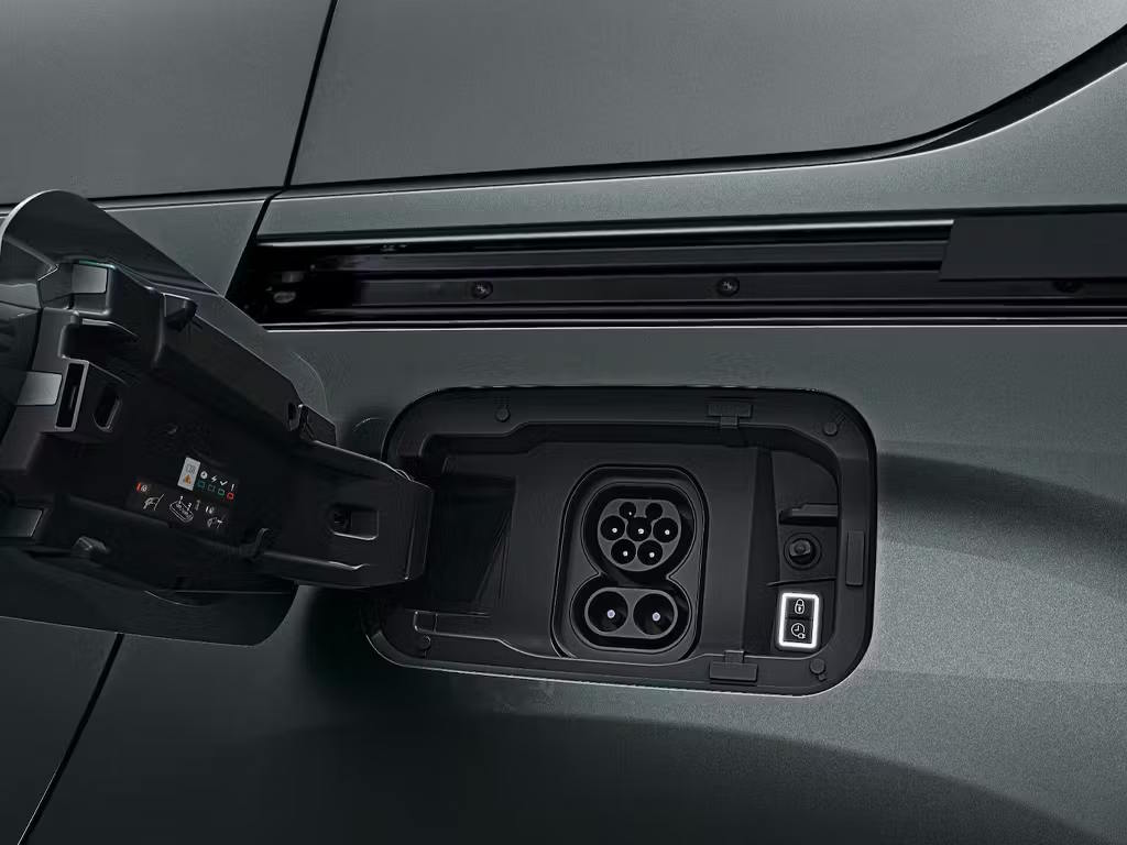 Open charging port on a Vauxhall Combo Electric showing the vehicle’s electric charging connection behind the side access flap.