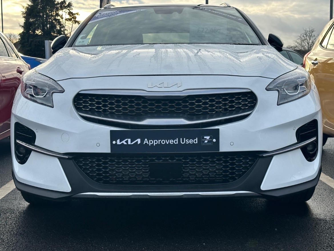 Front view of a Kia Approved Used vehicle showcasing quality-approved standards and dealership-backed reassurance.