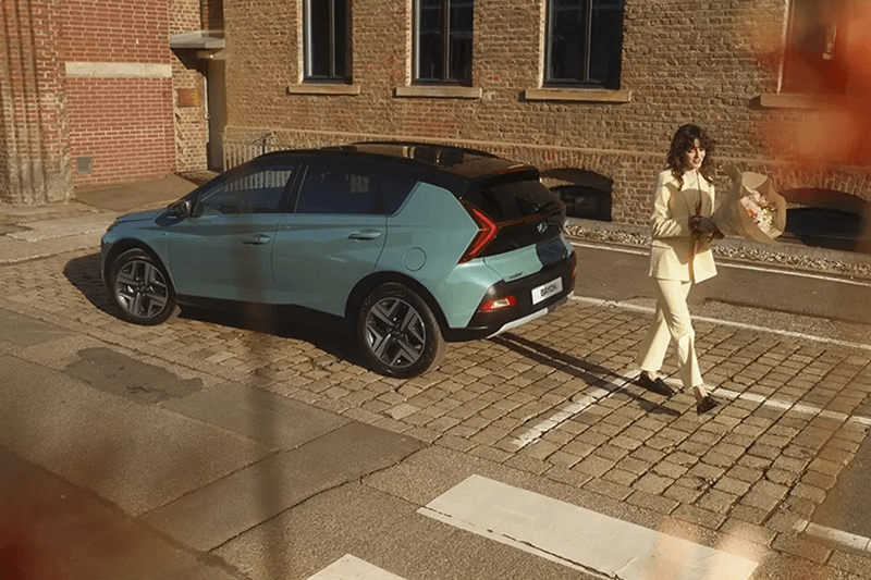 Woman walking away from car