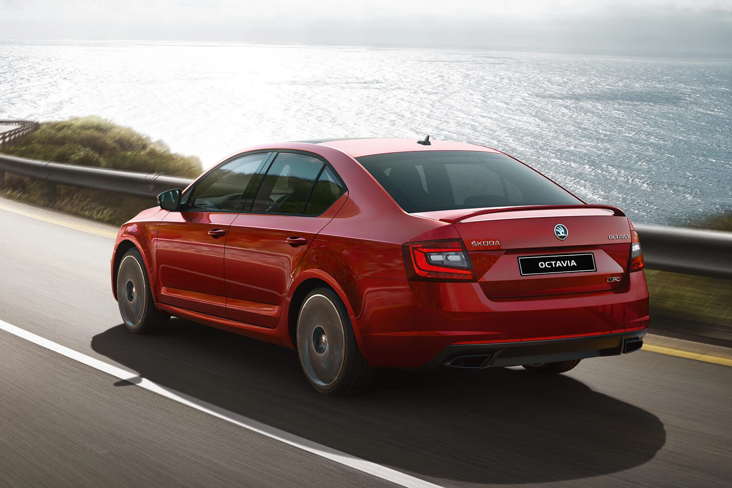 rear side on view of red skoda octavia