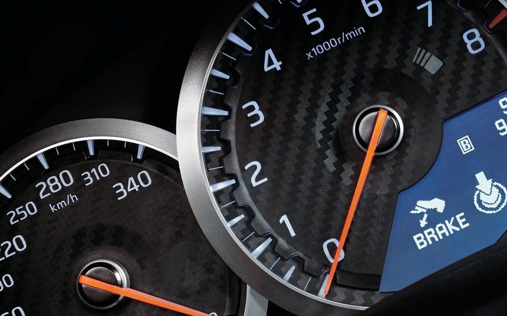 Close up of car dashboard speed gauge
