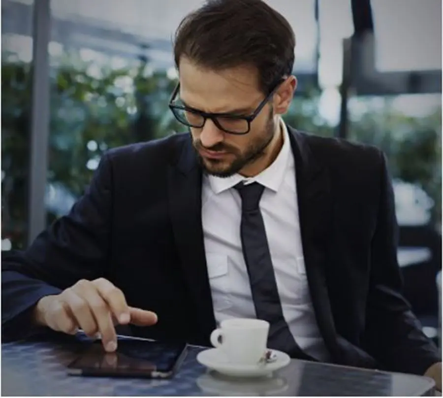 Man On Tablet