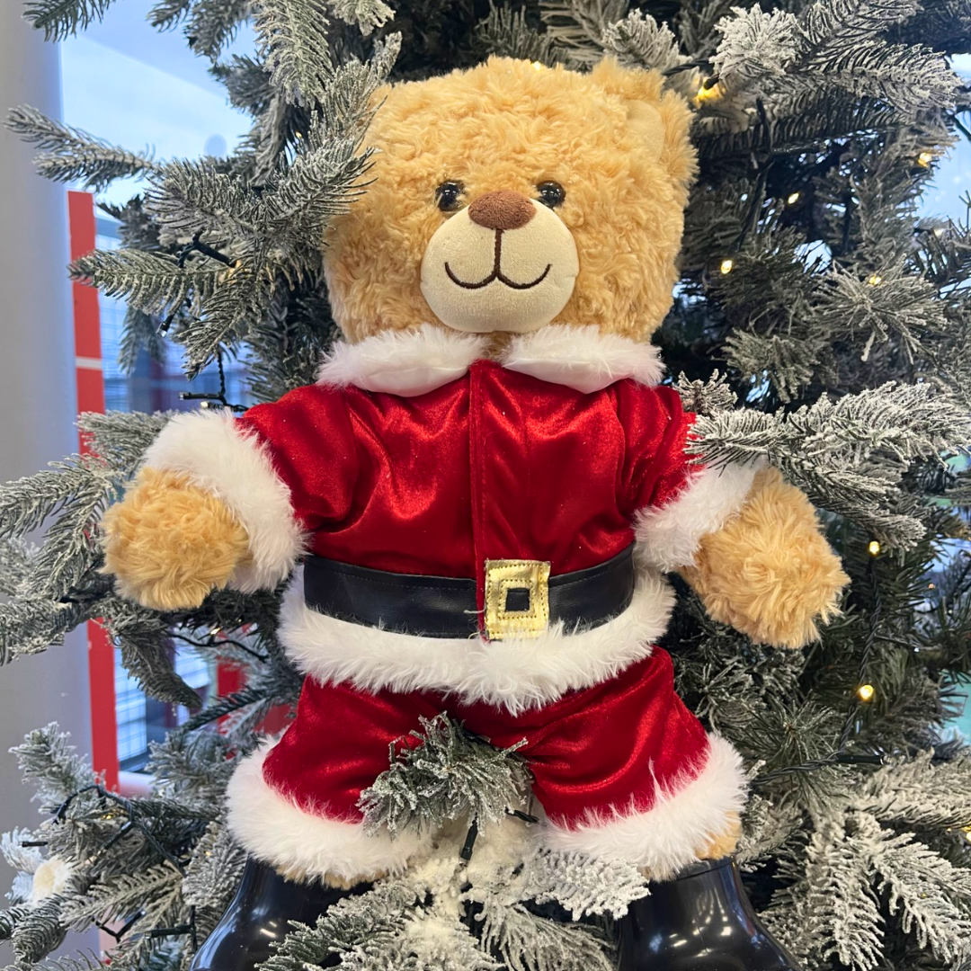 Santa teddy in christmas tree