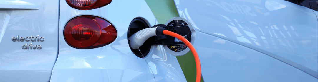 EV Electric Car White being charged