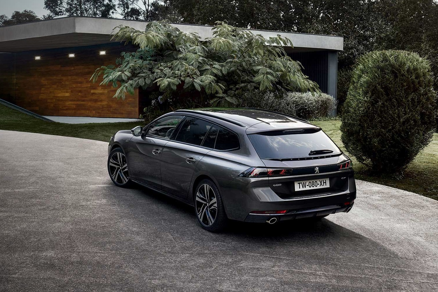 Peugeot 508 parked on driveway