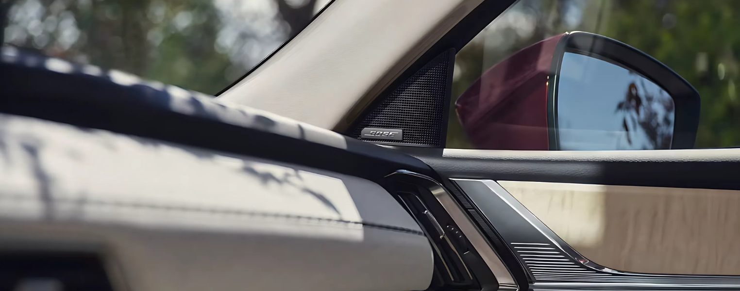 Mazda CX-80 interior showing dashboard and side mirrors.
