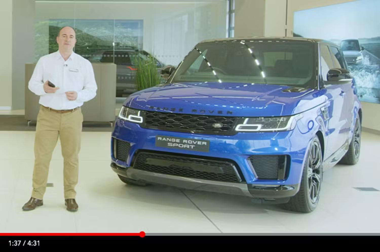 Blue Range Rover Sport In a showroom