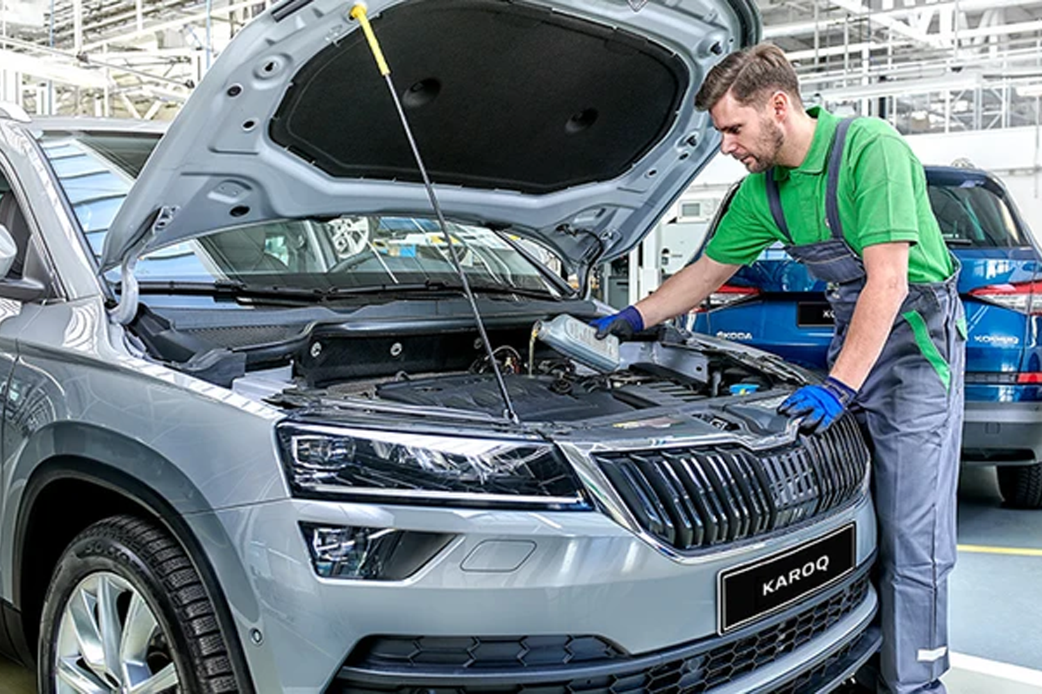 Skoda technician looking under bonnet