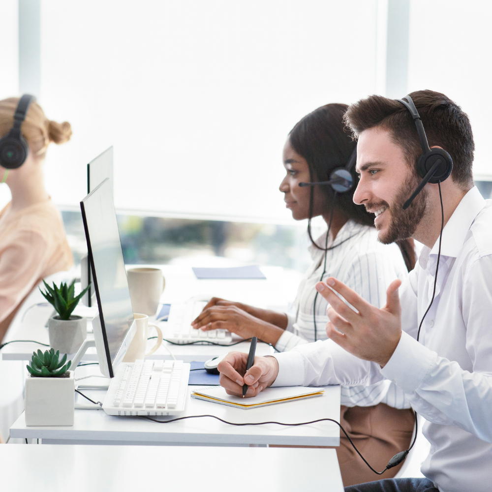 Person On Phone at desk