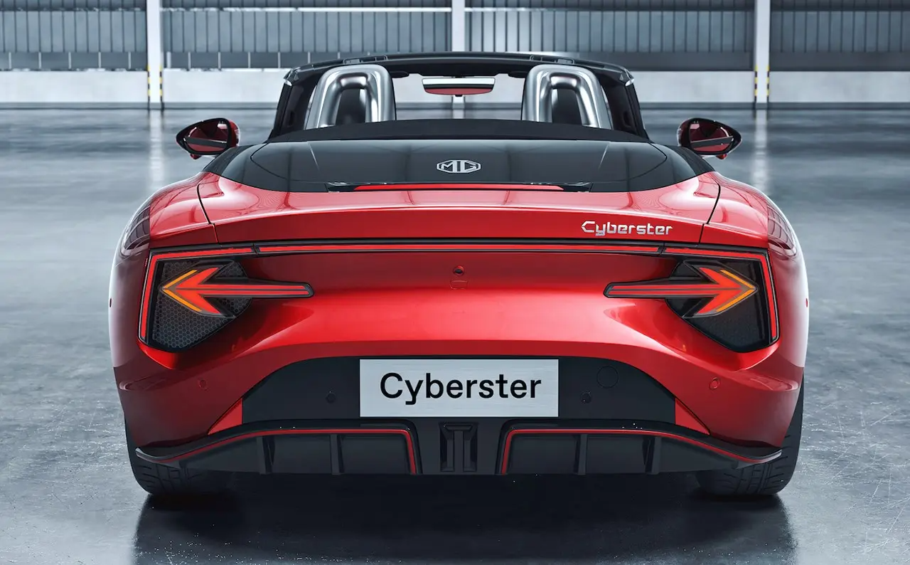 Red Cyberster convertible parked rear view