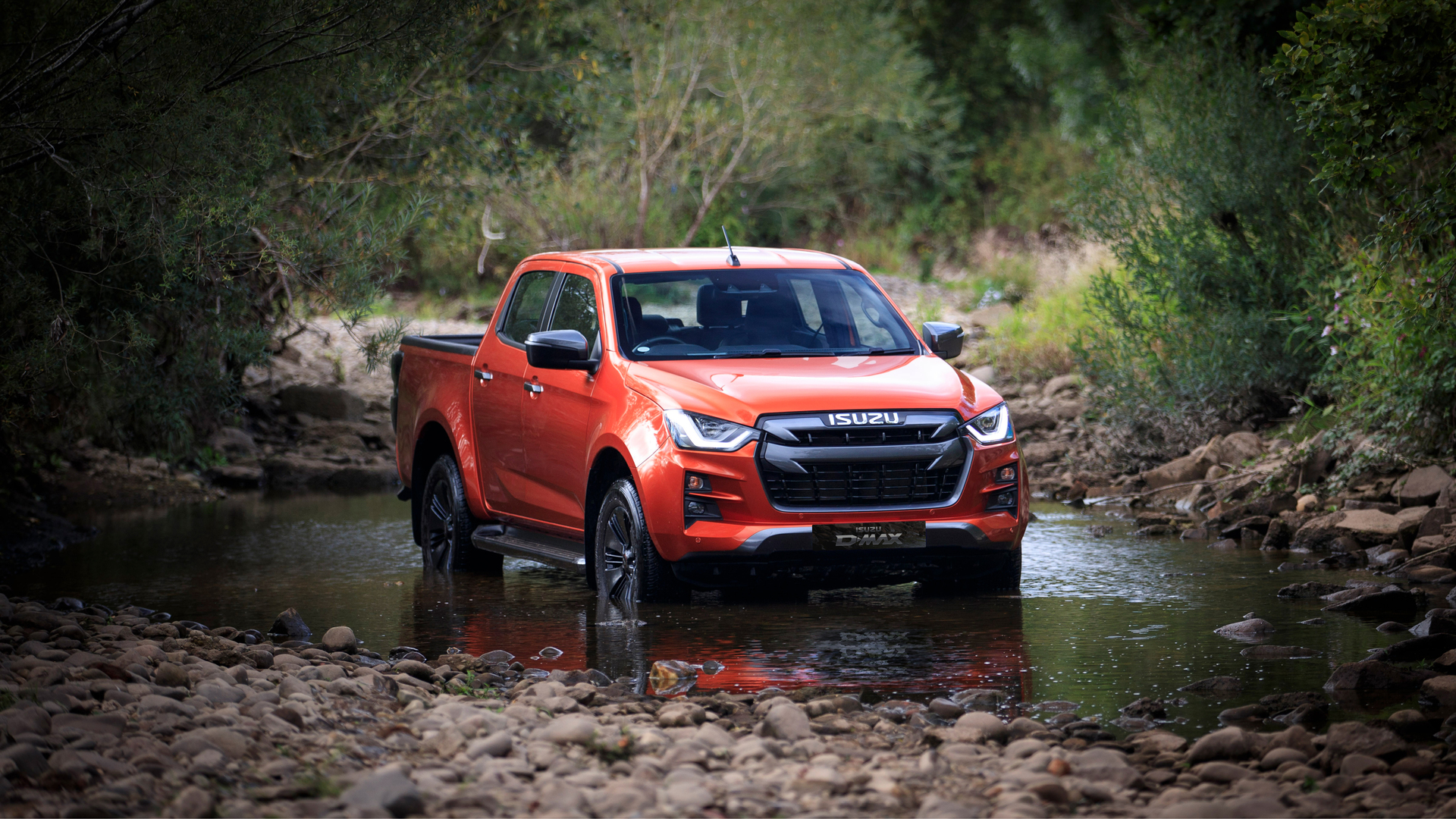 Red Isuzu D-Max V-Cross