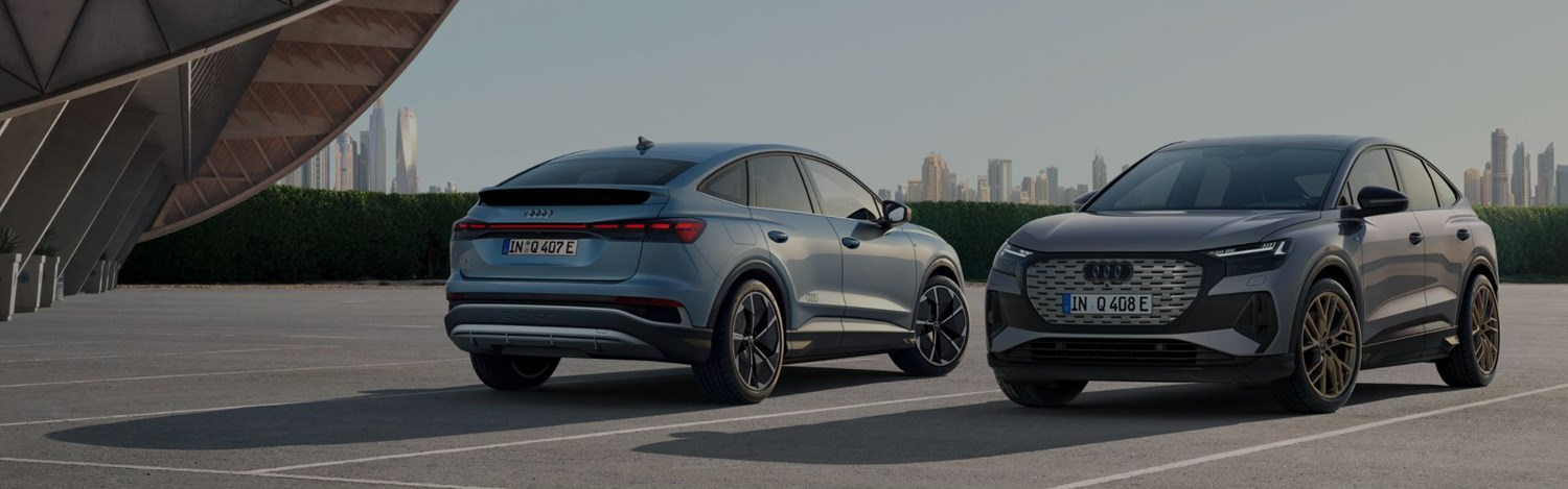 Two Audi Vehicles