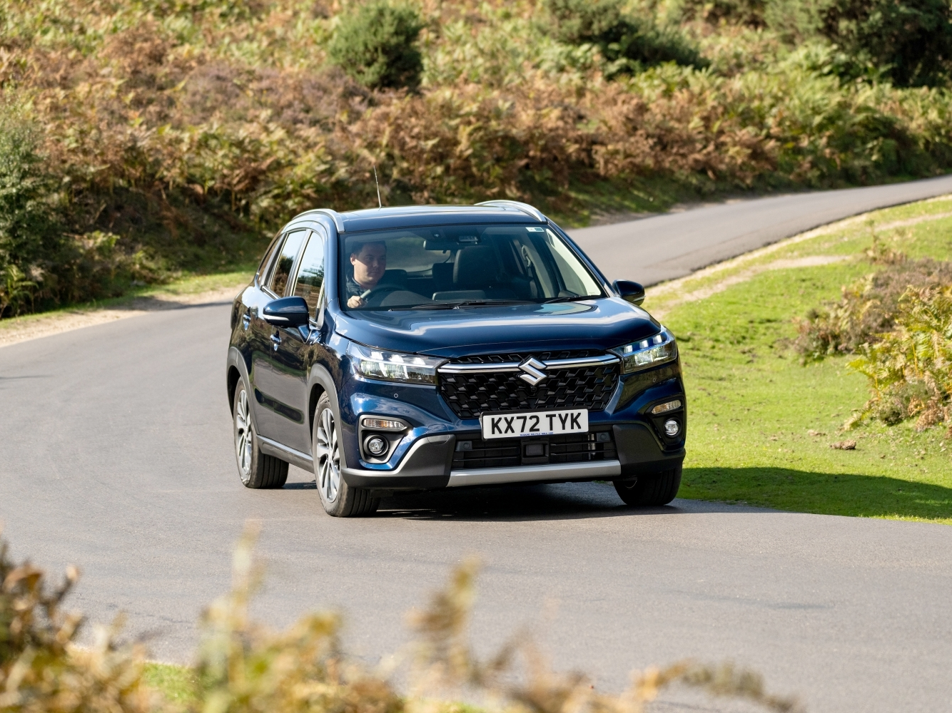 S Cross exterior in blue on the road
