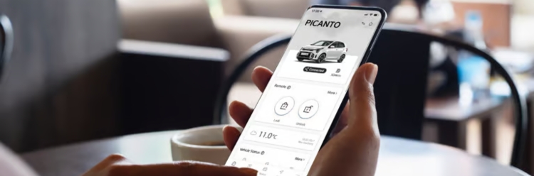 Kia app displayed on a smartphone connected to a Kia Picanto.