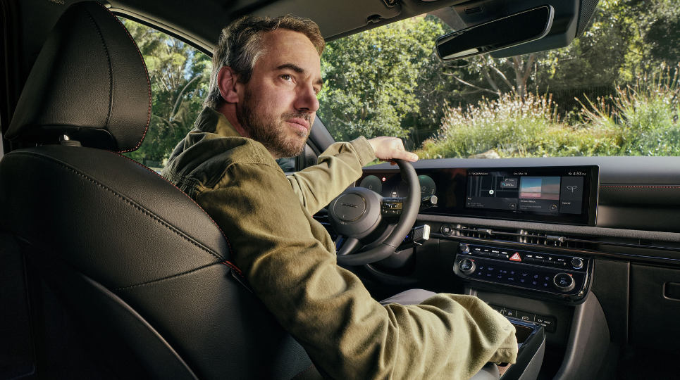 Man in drivers seat of Hyundai Tucson