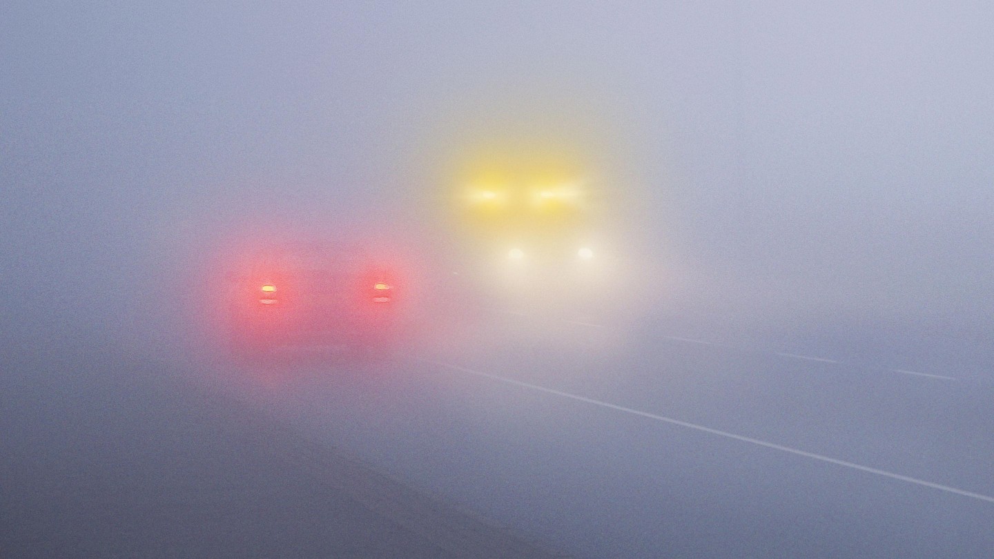 Car broken down in bad weather