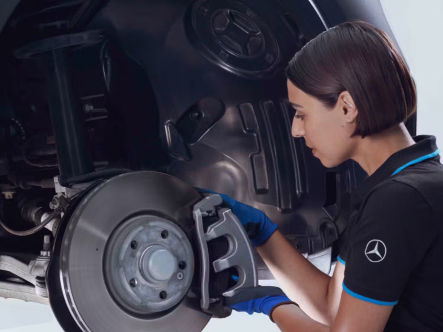 Mercedes-Benz Mechanic inspecting Brake Disc