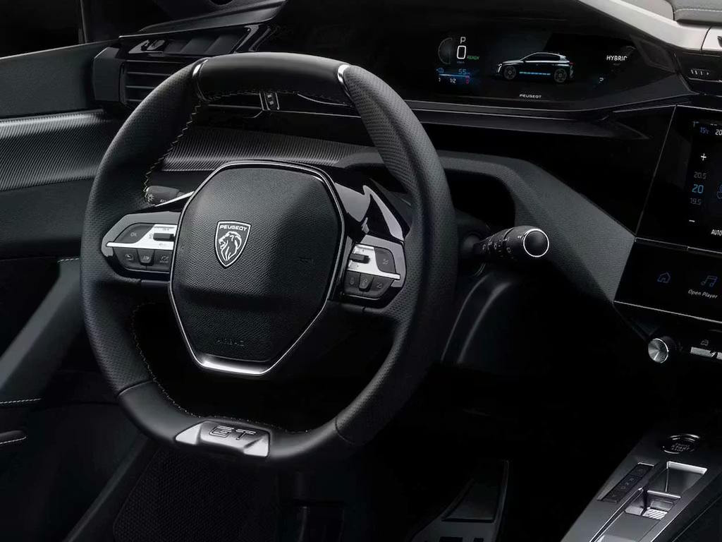 Peugeot 308 interior featuring the Peugeot i-Cockpit, compact GT steering wheel, digital instrument cluster and driver-focused controls.