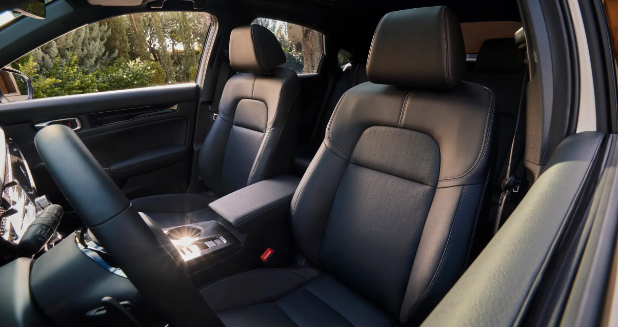The two front seats within the 2026 Honda Civic Hybrid.