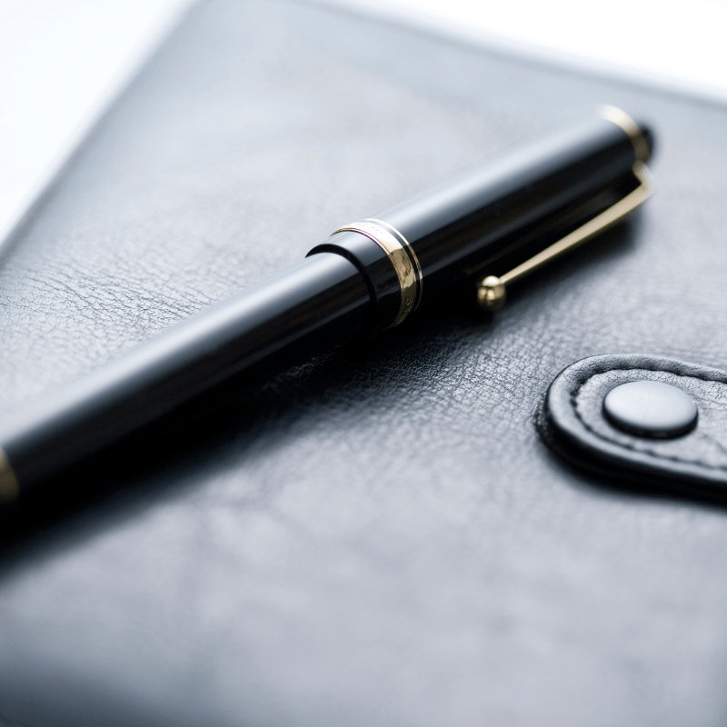 Pen On Notepad