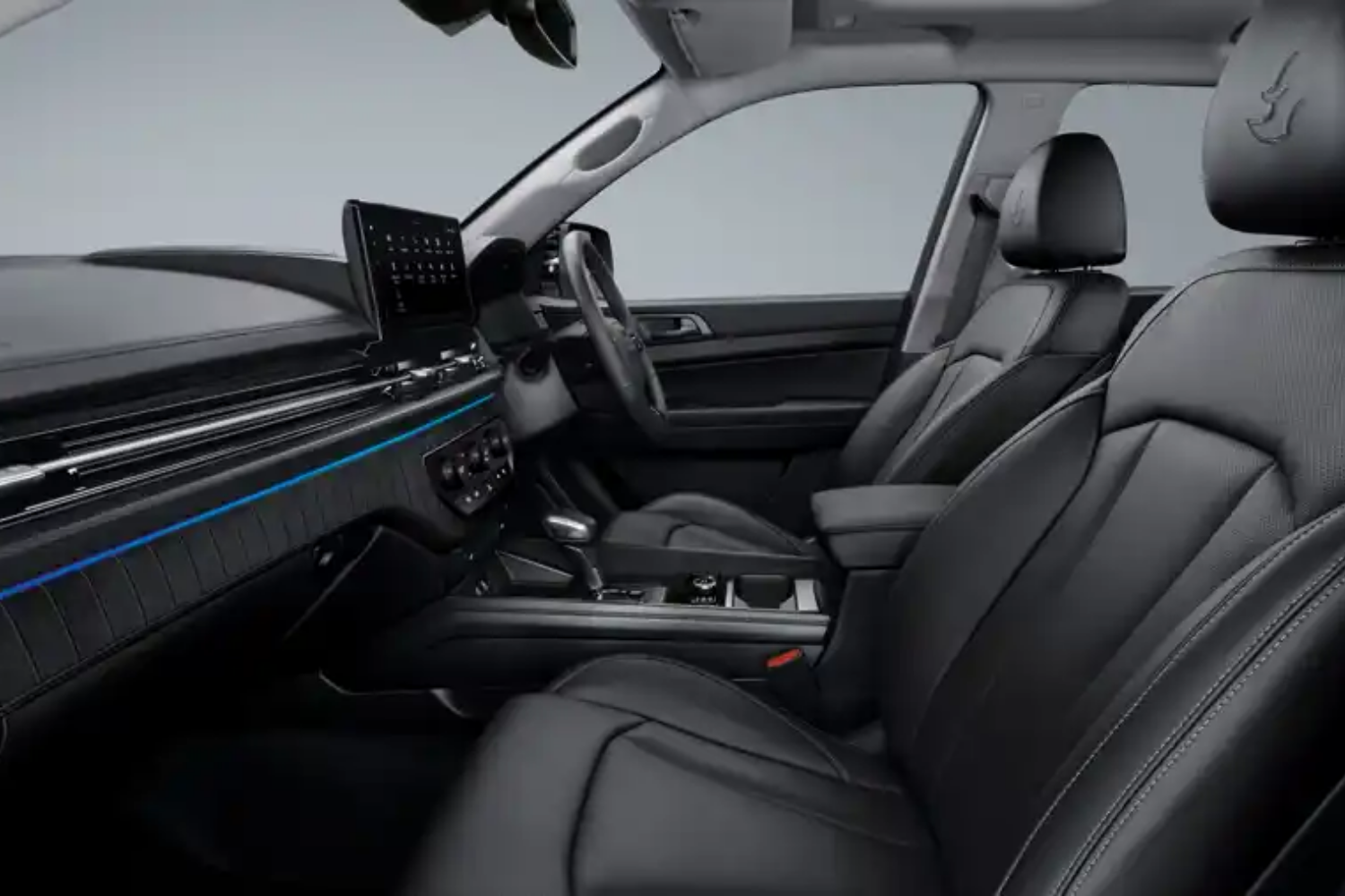 KGM Musso Rhino cabin interior with dashboard and front seats