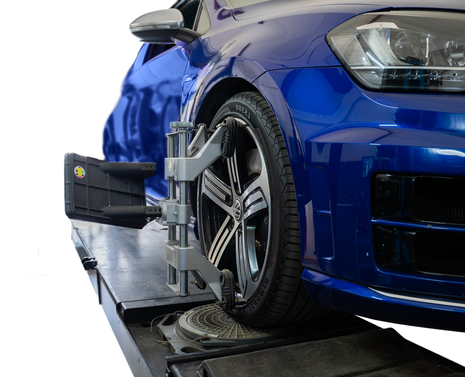 Wheels being aligned on car