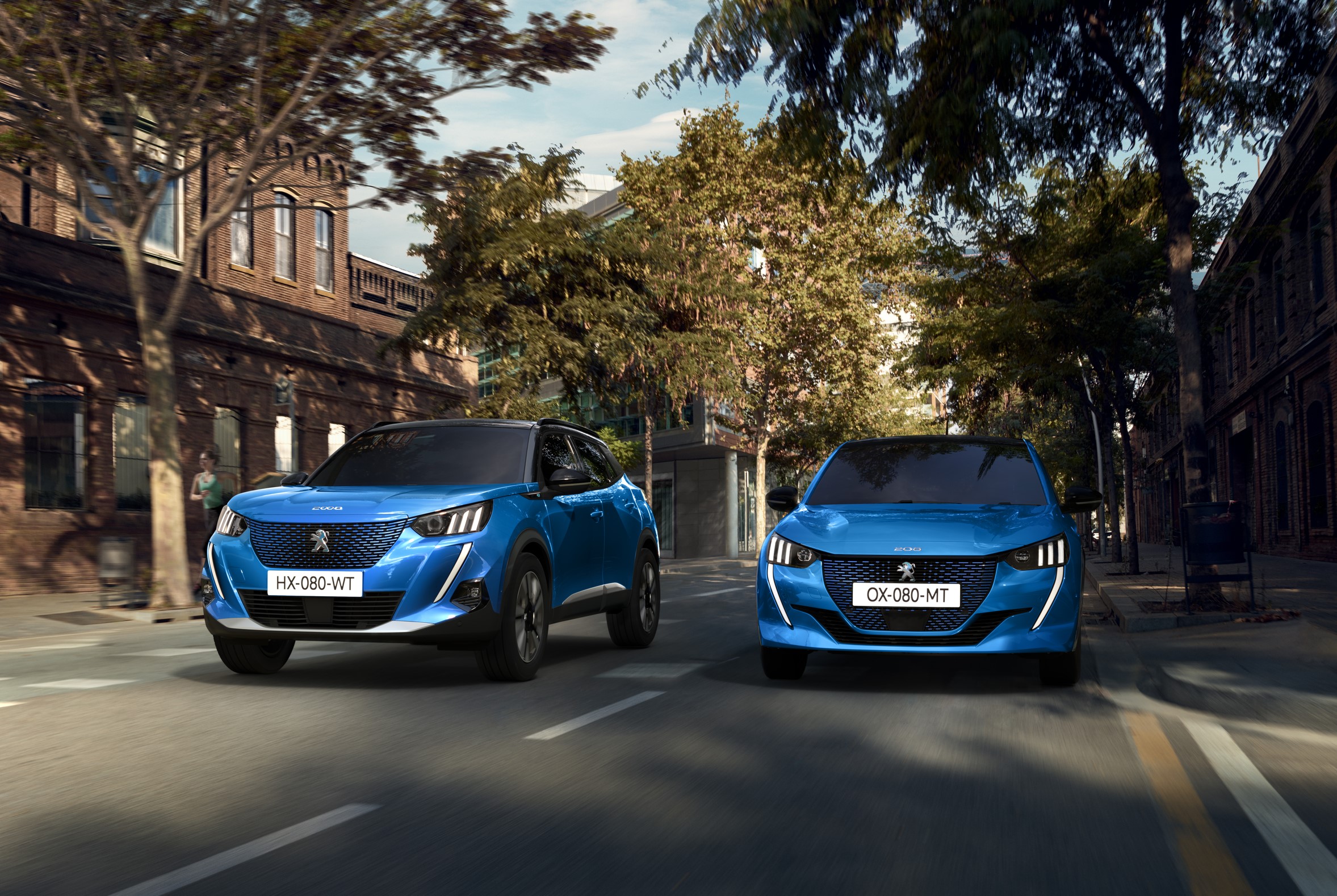 Blue Peugeot e-208 and e-2008