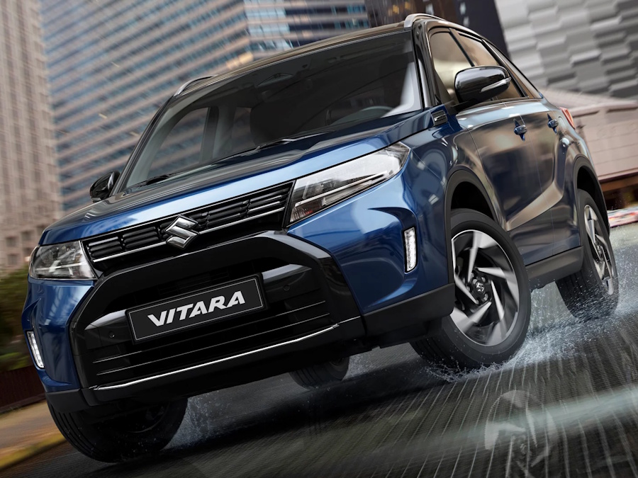 blue Suzuki Vitara by the city