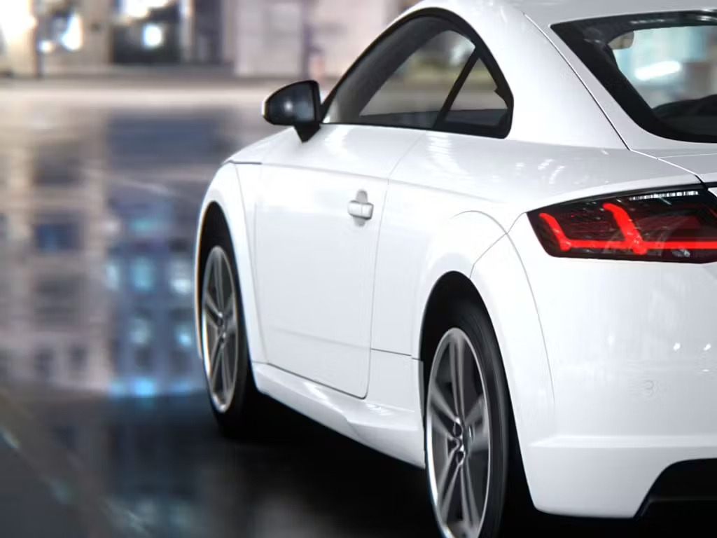 White Audi TT Driving forwards