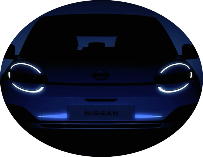 New Nissan Micra in a shadow with headlights on
