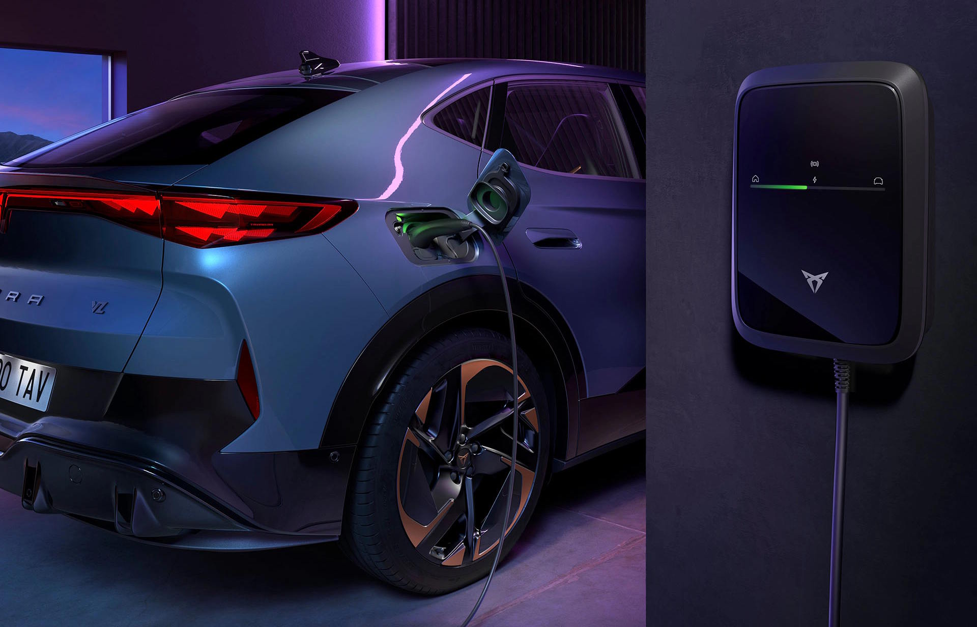 CUPRA Tavascan charging at a home wallbox, showing the rear side of the vehicle.