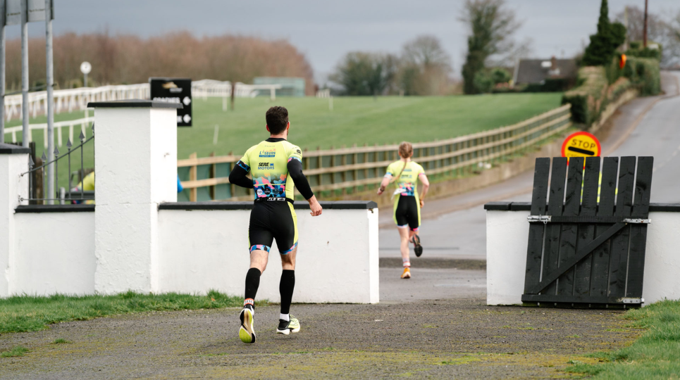 Man and Woman running at SERE Lisburn Duathlon