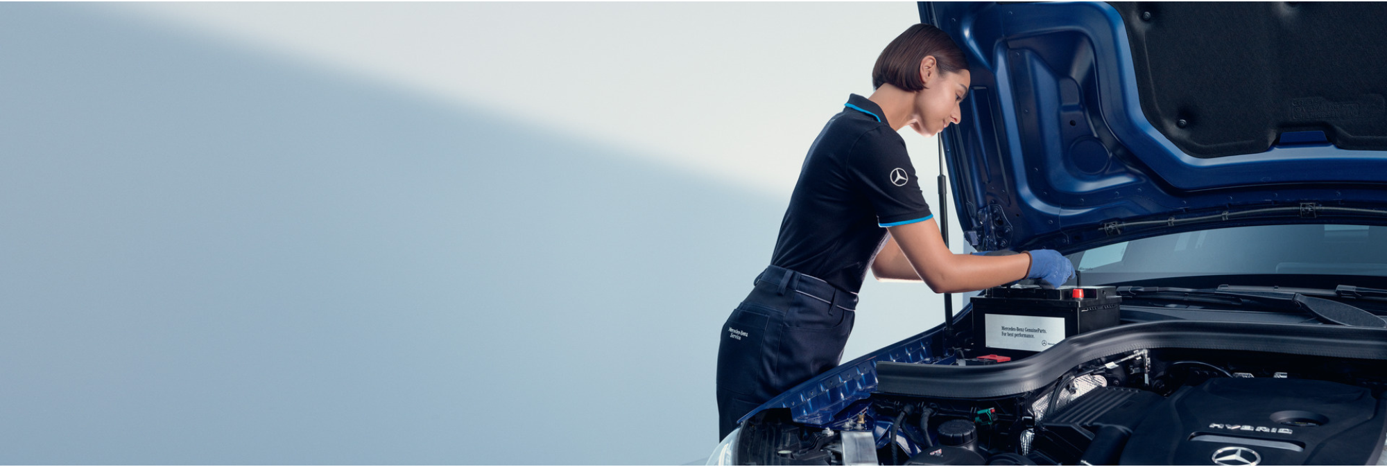 Mercedes-Benz Mechanic Working on Mercedes-Benz battery