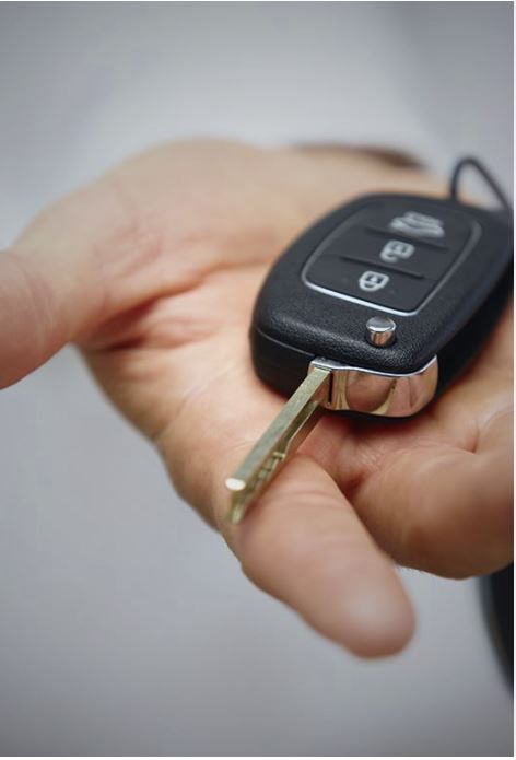 Key in persons hand
