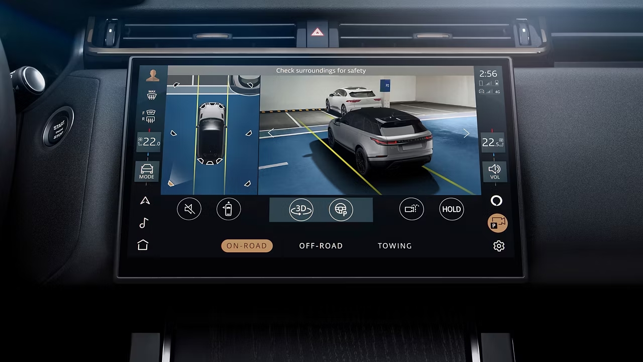 Range Rover Velar infotainment screen showing 3D parking camera view.