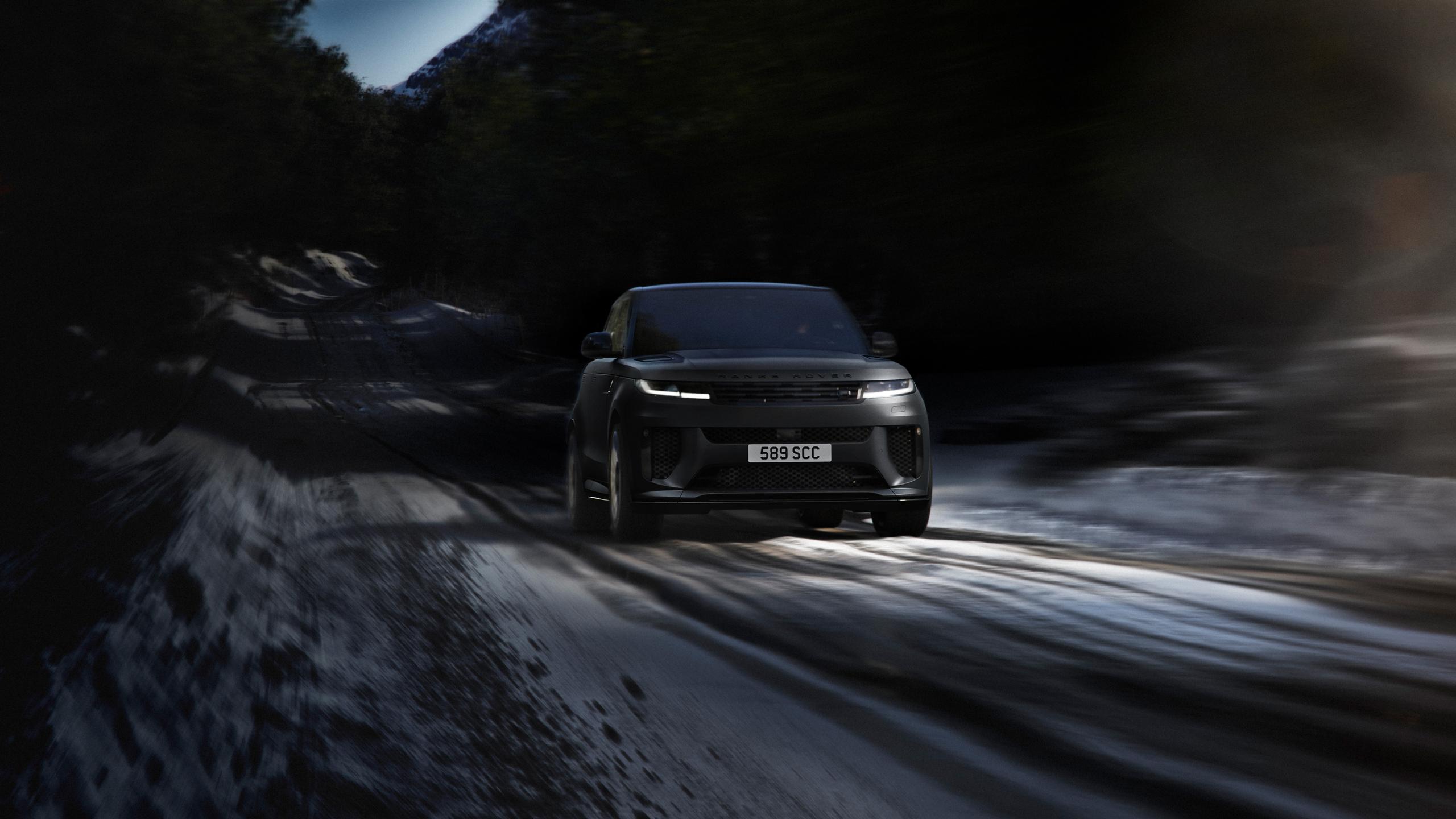 Black range rover sv on a highway