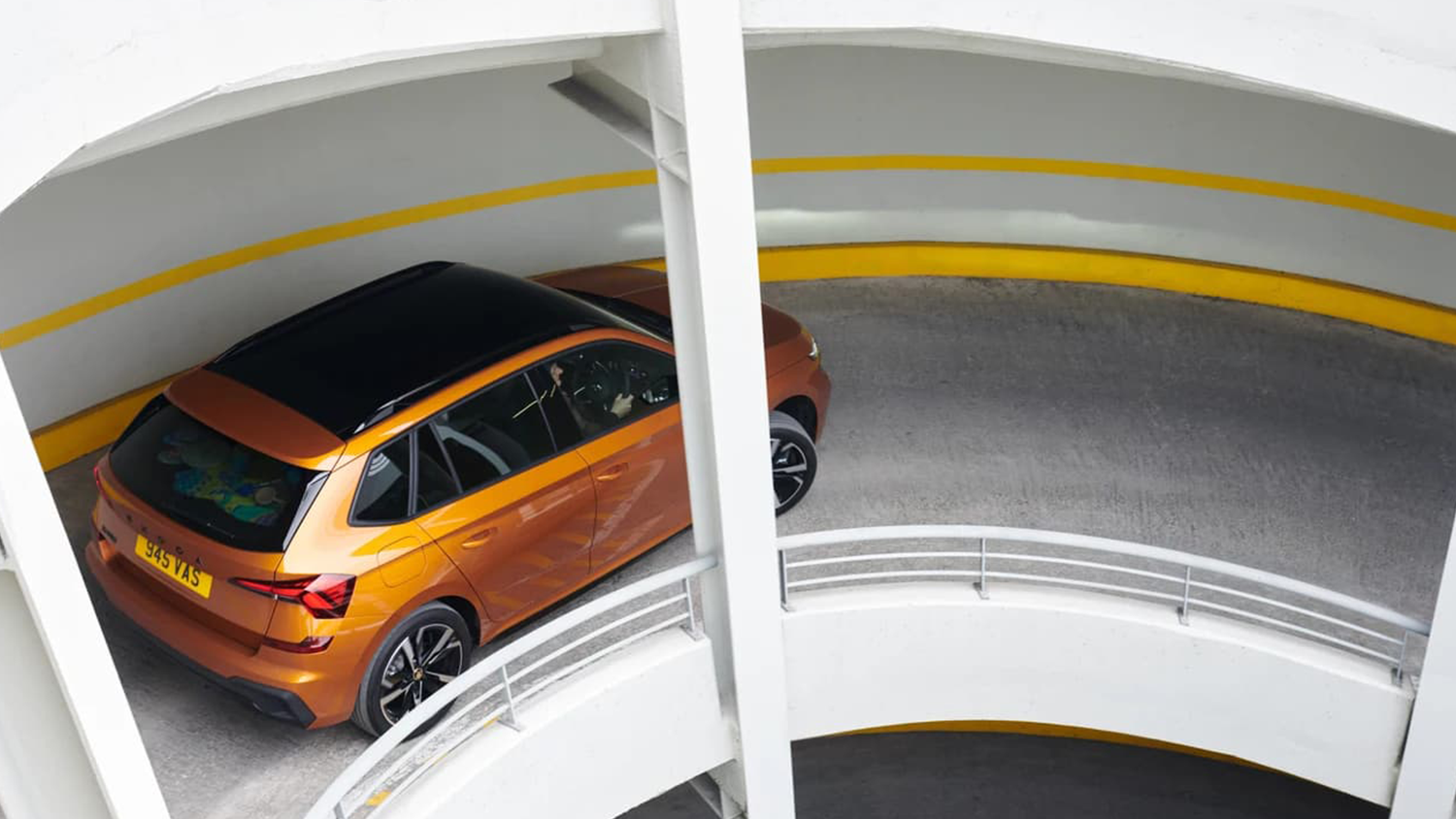 car driving down spiral carpark exit 